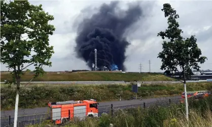  ?? Photograph: Roberto Pfeil/afp/AFP/Getty Images ?? Smoke rises from the site of the explosion in Leverkusen’s Bürrig district.