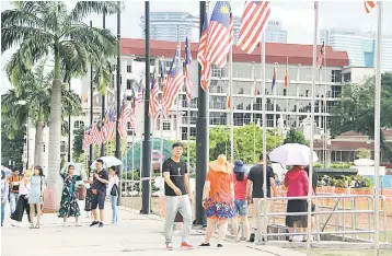  ?? — Bernama photo ?? The overall economic growth momentum for Malaysia in 2018 is expected to remain resilient at 4.9 per cent, moderately lower than our initially forecasted 5.2 per cent, on the back of robust private consumptio­n and slowing import activity, RAM Ratings observed.