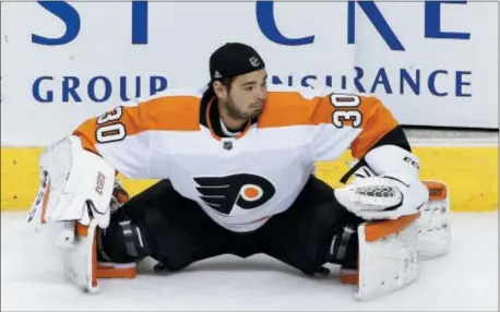  ?? THE ASSOCIATED PRESS FILE ?? With Brian Elliott recovering from surgery, Michal Neuvirth (pictured Saturday in Glendale, Ariz.) is now the Flyers’ stretch-drive goaltender. That is unless general manager and former goalie Ron Hextall’s actions leading up to the league trade...