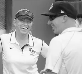  ?? COURTESY OF UCF ATHLETICS ?? UCF softball coach Renee Luers-Gillispie, left, and the Knights scored their first win in school history over Florida on this date in 2005.