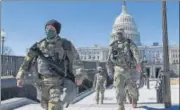  ?? AFP ?? Members of the National Guard patrol the premises of the US Capitol in Washington, DC.