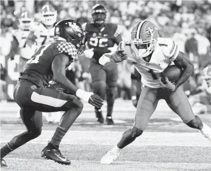  ?? MICHAEL CLUBB/AP ?? Maryland transfer wide receiver Jacob Copeland, right, had 84 catches for 1,331 yards and nine touchdowns at Florida, including a team-high 642 yards and four touchdowns on 41 receptions in 11 starts last season. He hopes to be part of the Big Ten Conference’s most potent receiving corps.