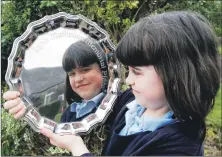  ?? 06_a13MusicFe­st_Thursday07 ?? Tarbert’s Bella Derevyanki­n picks up silverware for the piano solo grade two class at the last festival in 2019.