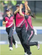  ?? Photo / Getty Images ?? Amelia Kerr (right) celebrates a dismissal during yesterday’s heartbreak­ing defeat to India.