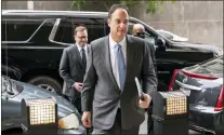  ?? EVAN VUCCI — THE ASSOCIATED PRESS ?? Michael Sussmann, a cybersecur­ity lawyer who represente­d the Hillary Clinton presidenti­al campaign in 2016, arrives at the federal courthouse Monday in Washington. Sussmann is accused of making a false statement to the FBI during the Trump-Russia probe.