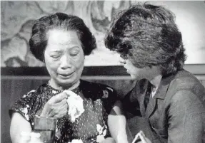  ?? PAULINE LUBENS/DETROIT FREE PRESS ?? Zia comforts Lily Chin, the mother of Vincent Chin, who was killed because of his race, during a news conference in 1984. Zia fought for justice for Vincent Chin, mobilizing an Asian American rights movement.