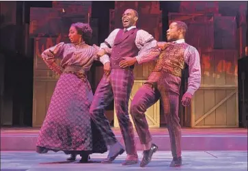  ?? Jenny Graham ?? CANDACE WASHINGTON, left, Clifton Duncan and Cornelius Jones Jr. perform the “Gettin’ Ready Rag.”