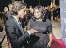  ??  ?? “SHAPE OF Water’s” Octavia Spencer talks with “Call Me by Your Name’s” Timothée Chalamet, male Rising Star Award recipient.
