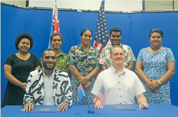  ??  ?? U.S. Embassy Suva’s Chargé d’Affaires Tony Greubel during a signing with the Civic Leaders for Clean Transactio­ns PTE Ltd (CLCT) Integrity Fiji where a US$6,470(FJ$13,380) grant was signed.