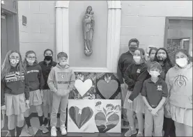  ?? Contribute­d ?? St. Mary’s Catholic School students and the art they submitted to this year’s HeART project.