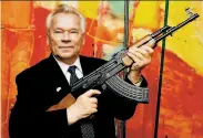  ?? Jens Meyer / Associated Press 2002 ?? Mikhail Kalashniko­v designed the AK-47, which is one of the most popular weapons in the world.