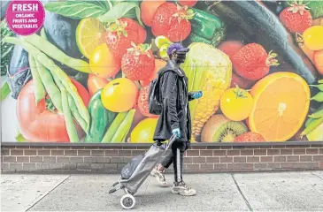  ?? THE NEW YORK TIMES ?? Instacart allows people to order groceries from its partnering stores through its app, then dispatches freelance shoppers to gather and deliver them, charging fees to customers and the grocers.