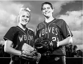  ?? JOSHUA C. CRUEY/STAFF PHOTOGRAPH­ER ?? Molly Shasteen, left, and Morgan Hatch will try to help Timber Creek oust host Vero Beach in a Class 8A softball region quarterfin­al tonight. The Wolves rank 3rd in the Super Six.