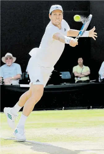  ?? Berdychovi se letos na grandslame­ch nedařilo, ve Wimbledonu už prošel nejdál. FOTO ČTK/ AP ?? Prolomil trápení?