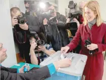  ?? — AFP ?? Kaja Kallas, leader of the Reform Party casts her ballot in a polling station during Estonia’s general election in Tallin.