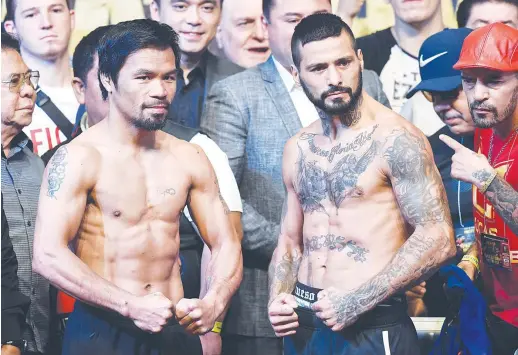  ?? AFP PHOTO ?? BATTLE IN KL Manny Pacquiao and Lucas Matthysse pose during the official weigh in at the Malaysia Internatio­nal Trade and Exhibition Center in Kuala Lumpur, Malaysia.