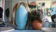  ?? EVE EDELHEIT/THE NEWYORK TIMES ?? Wigs at the home of Annrene Rowe in AnnaMaria, Fla., on Sept. 18.