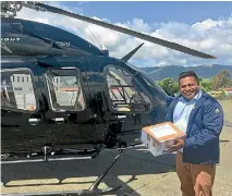  ?? PHOTO: JO MOIR/STUFF ?? Civil Defence Minister Kris Faafoi brings in medical supplies for Golden Bay Health Centre.