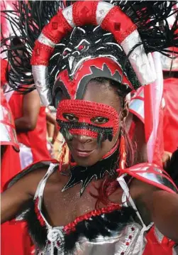  ?? Shirley Bahadur /AP ?? A masquerade­r of the band “Trini Revelers” parades during the Carnival celebratio­n through the streets of Portof-Spain, Trinidad.
