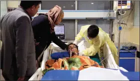  ?? (AP/Mariam Zuhaib) ?? An Afghan receives treatment at a hospital Saturday after a suicide attack in Kabul, Afghanista­n.