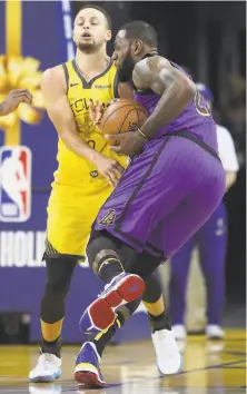  ?? Scott Strazzante / The Chronicle 2018 ?? LeBron James (right) once saw Stephen Curry as a threat for the title of NBA’s best. James has not won an MVP since 2013.