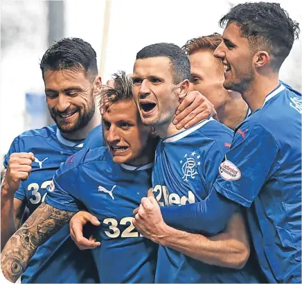  ??  ?? Jason Cummings and Jamie Murphy (centre) have made an impression with Rangers during their loan spells, and now have a chance to make their mark with Scotland