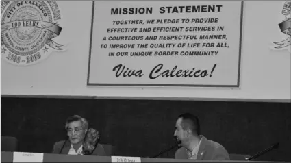  ?? PHOTO MICHAEL MARESH ?? Imperial Irrigation District Division 4 candidates Joong Kim and Erik Ortega speak at the end of Tuesday’s night’s candidate forum in Calexico.