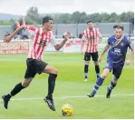  ??  ?? Evesham’s Kai Tonge on the ball