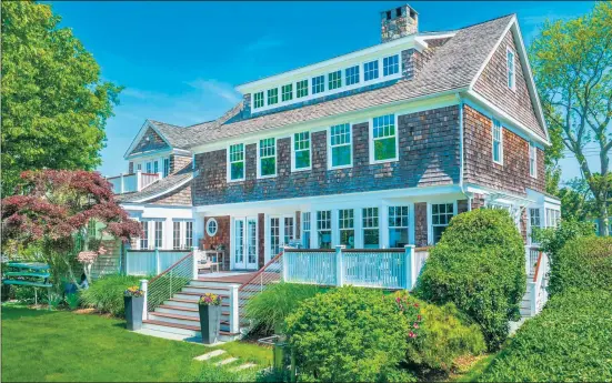  ?? Contribute­d by Corcoran Centric Realty ?? Built in 1932, the Nantucket-style colonial at 24 Rocky Point Road, Old Greenwich, is a five-bedroom single-family home with water views. The property is listed for $4.975 million by Jeffrey Jackson and Konstantin­e Wells with Corcoran Centric Realty. Photo: James Gagliardi/Modern Media