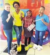  ??  ?? SNUG FIT: Getting ready for Slipper Day on May 11, are, from left, Nadine Axelsen, Oyama Gajana, Nomava Gcilishe and East London Reach For A Dream branch manager Lwanele Mpeta