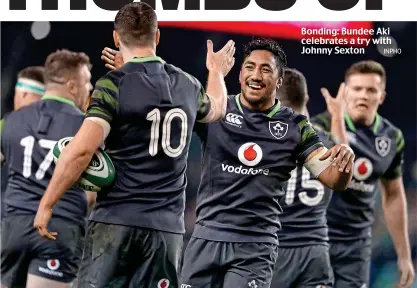  ?? INPHO ?? Bonding: Bundee Aki celebrates a try with Johnny Sexton