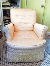  ?? [PHOTO BY JURA KONCIUS, THE WASHINGTON POST] ?? This $35 thrift shop chair shown in Jura Koncius’ guest bedroom is in need of reupholste­ring. But is it worth the cost?