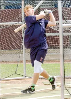  ?? Herald photo by Dale Woodard ?? Newest Lethbridge Bulls outfielder Grant Kerry takes some swings in the batting cage during Bulls practice Friday afternoon at Spitz Stadium.