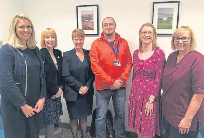  ??  ?? Gavin Ellis with, from left, hospital manager Gemma Couser, head of midwifery Aileen Lawrie, director of nursing Helen Wright, Shirley-Anne Somerville MSP and clinical midwife Lorna Eldridge.