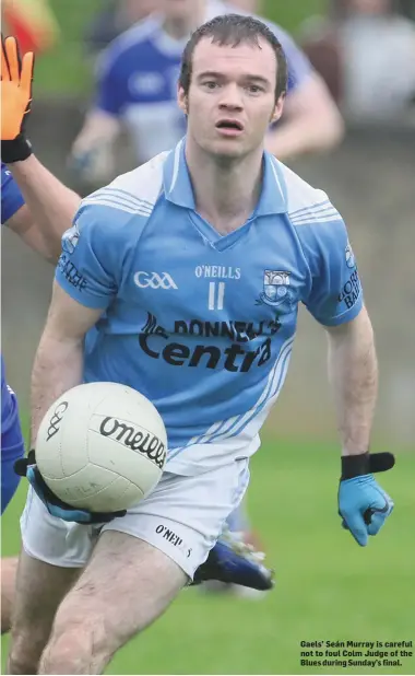  ??  ?? Gaels’ Seán Murray is careful not to foul Colm Judge of the Blues during Sunday’s final.