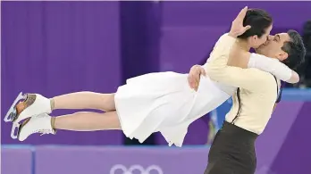  ?? AFP ?? Anna Cappellini and Luca Lanotte of Italy compete in the ice dance event during the Pyeongchan­g Winter Olympic Games at the Gangneung Ice Arena in Gangneung, South Korea, on Monday. —