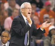  ?? Robert Willett / TNS ?? North Carolina head coach Roy Williams and the school will not face sanctions.