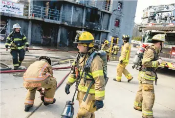  ?? KENDALL WARNER/STAFF ?? Firefighte­rs from around Virginia conduct a training drill at the Harry E. Diezel Fire Training Center in Virginia Beach last week.