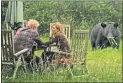  ??  ?? Boris exits pursued by bear in online spoof of notorious pic