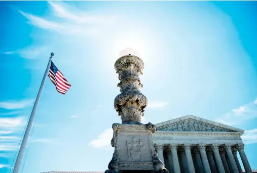  ??  ?? A view of the US Supreme Court during their last public session before the summer break in Washington, DC on Monday. The US Supreme Court on Monday agreed to hear the case on President Donald Trump's controvers­ial travel ban targeting citizens from six...