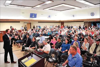  ??  ?? Assemblyma­n James Gallagher, R-Yuba City, addresses the crowd during a feedback session on the Oroville Dam spillway incident and the evacuation last month on Tuesday at the Veterans Hall in Yuba City.