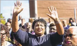  ?? Melina Mara Washington Post ?? D E M O C R AT Stacey Abrams nearly became the first black female governor in the nation. The election had workers in the “Hollywood of the South” on edge.