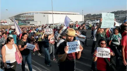  ?? PHOTO: REUTERS ?? People opposing the impeachmen­t of Brazil’s suspended President Dilma Rousseff attend a demonstrat­ion against interim President Michel Temer in Sao Paulo, last week.