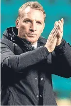  ??  ?? Brendan Rodgers acknowledg­es the Celtic support after full-time.