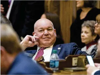  ?? ALYSSA POINTER PHOTOS / ALYSSA.POINTER@AJC.COM ?? Senate majority leader Mike Dugan (center), R-Carrollton, listens as his Senate colleagues discuss a bill during Monday’s opening session at the State Capitol building in Atlanta. The current term is expected to last until late March or early April.