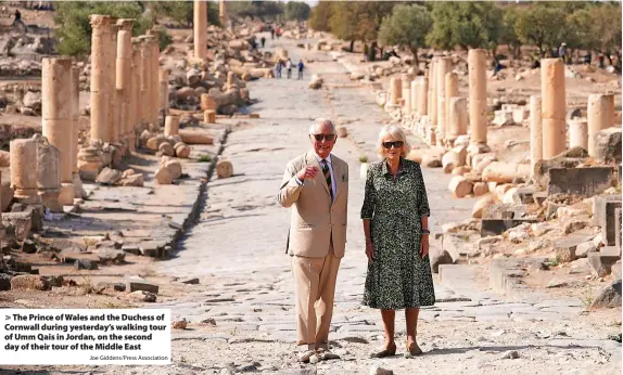  ?? Joe Giddens/Press Associatio­n ?? > The Prince of Wales and the Duchess of Cornwall during yesterday’s walking tour of Umm Qais in Jordan, on the second day of their tour of the Middle East