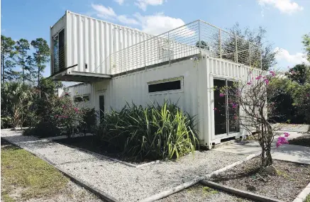  ??  ?? Rick Clegg’s shipping container house in Jupiter Farms, Florida. The container house is being used as an Airbnb rental and as an eco retreat for tourists who don’t want to stay in a hotel or sleep in a tent.