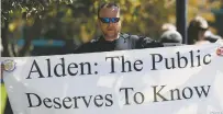  ?? ASSOCIATED PRESS FILE PHOTO ?? Stephen Linder, who works in the newsprint department of the Denver Post, holds up a banner during a rally against the paper’s ownership group, Alden Global Capital, May 8 in Denver. Guilds urged Alden Capital to invest in the newspapers that it...