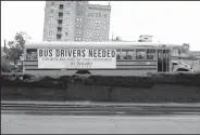  ?? Michael Shine/ News-Times ?? Bus Drivers: El Dorado School District has been advertisin­g the need for bus drivers on a school bus next to the central office. Other school districts in the county are also looking for more bus drivers, but only El Dorado and Junction City are short for daily drivers.