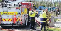  ?? PHOTO: ABBEY PALMER ?? Fire and Emergency New Zealand crews were called to an Invercargi­ll vehicle repair yard in Otatara Rd yesterday to find four cars and several tyres in flames.